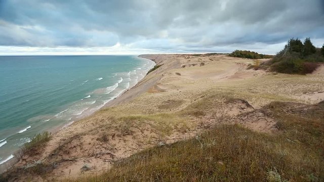 Loop features waves breaking on the Lake Superior Coast of Upper Peninsula Michigan along Grand Sable Dunes, a stretch of tall sand dunes near Grand Marais in Pictured Rocks National Lakeshore.