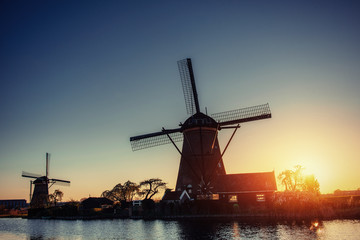 Traditional Dutch windmills from the channel Rotterdam. Holland