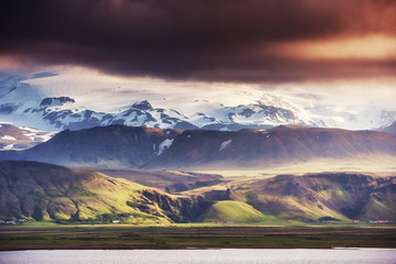 Gentle slopes of snow-capped mountains and glaciers. Wonderful I