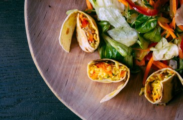 Tortilla wraps with rice and vegetables. Healthy vegetarian food.