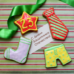 ginger cookies in the shape of clothing for 23 february