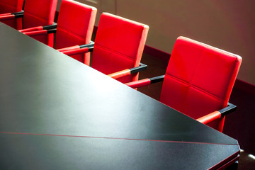 The boardroom table is set for the General Meeting