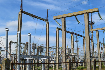 Fototapeta na wymiar Electric substation. power transmission equipment. Stobo, wires and insulators.