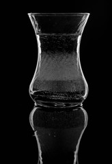water on a glass on dark background.