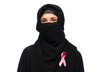 muslim woman with breast cancer awareness ribbon