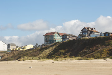 Residential homes in coastal town with beach-front property