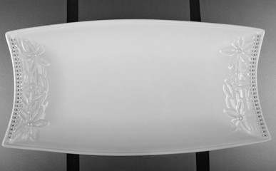 Shallow porcelain bowl with engraving