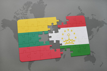 puzzle with the national flag of lithuania and tajikistan on a world map