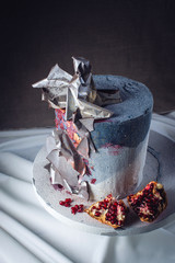 Wedding cake decorated in loft style, decorated with metal plates