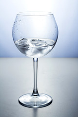 water with ice in a glass