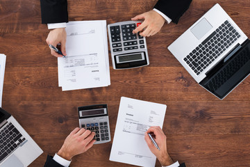 Two Businesspeople Calculating Financial Budget