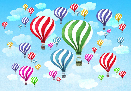 Hot air balloons with clouds on blue sky background