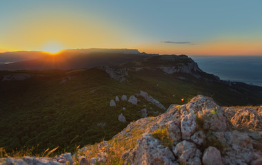 Fototapeta na wymiar Sunrise over the mountains of Southern Crimea. View from top of Mount Ilyas Kaya. Laspi Bay.