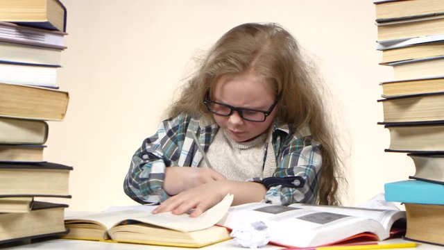 Little girl excitedly pulls a page from the book information. White background