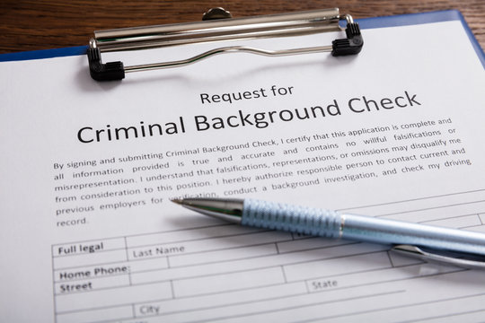 Criminal Background Check Application Form With Pen