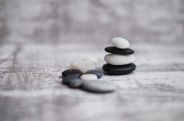 Fototapeta na wymiar Black and white stones. Sea pebbles.