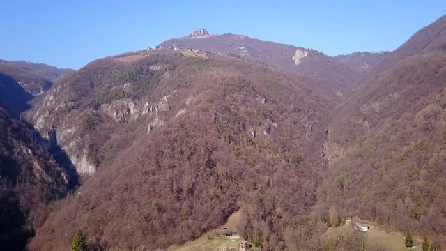Drone aerial view of the mountains around Albino (Bergamo) in winter season. Landscape to Rena and Cornagiera mountain 