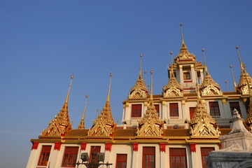 Naklejka premium Wat Ratchanatdaram ,Lohaprasat in Wat Ratchanatdaram Worawihan, beautiful temple view to skyline in Bangkok, Thailand