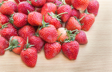 fresh ripe strawberries on wooden background
