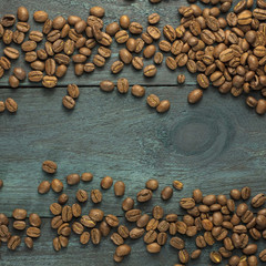 Coffee grains forming a frame with copyspace