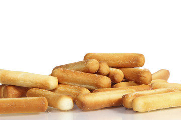 salty bread sticks on white background