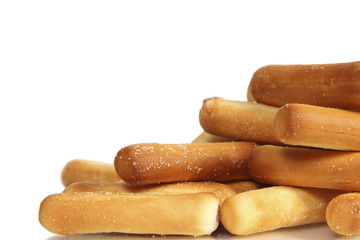 salty bread sticks on white background