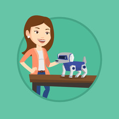 Happy young woman playing with robotic dog.