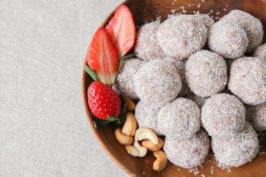 Homemade Strawberry, Date, Cashew And Coconut Bliss Ball