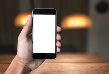man of business man hand working on laptop computer on wooden desk Laptop with blank screen on table.