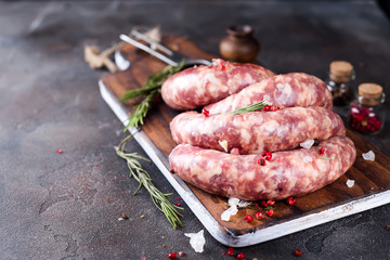 Raw sausages with spice