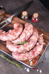 Raw sausages with spice