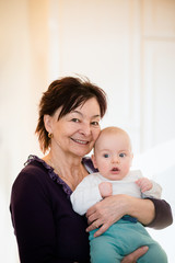 Grandmother with grandson hugging