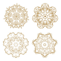 Set of 4 vector round golden lace design elements.