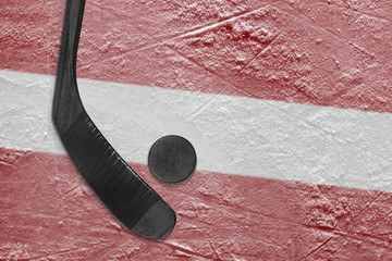 Naklejka premium Latvian flag and hockey stick hockey