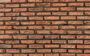 Red brick wall background with copy space.