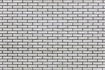 horizontal part of light yellow brick wall