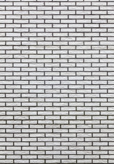 vertical part of light colored brick wall