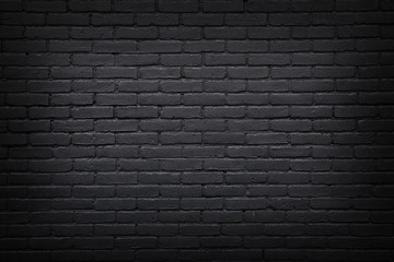 part of black painted brick wall