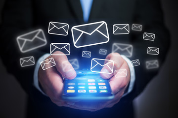 Concept of sending email on smartphone interface with message icon around