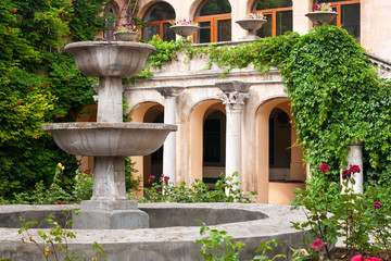 Cozy patio with small garden in museum of Chersonese. Sevastopol, Crimea