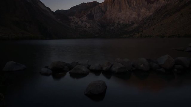 MoCo Timelapse of Sunrise at Reflective Alpine Lake in Eastern Sierra -Tilt Up-