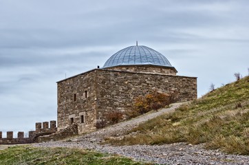 Temple with arcade is in the Genoese fortress. Sudak, Crimea.