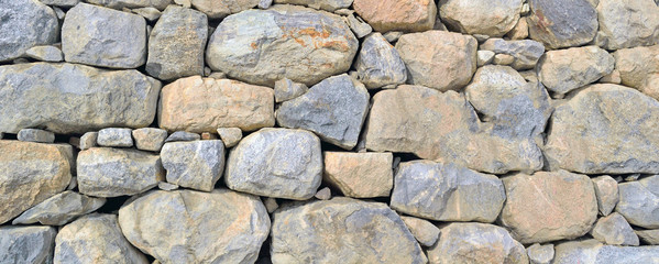 wall of large natural stones background
