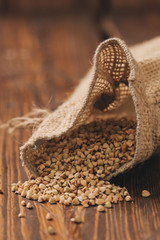 Buckwheat sack on wooden table