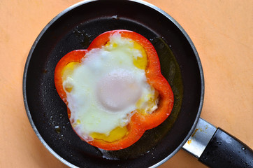 Fried egg with red pepper