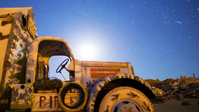 MoCo Astro Timelapse of Moonrise over Painted Landscape in Slab City -Zoom Out-