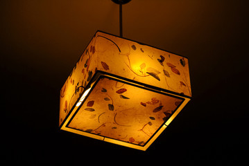 Hanging plastic square ceiling lamp with a yellow dim light