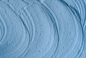 Blue cambrian cosmetic clay (facial mask, cream) texture close up, selective focus. Abstract background