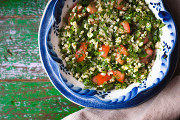 Vegetarian salad Tabbouleh with bulgur, mint and parsley