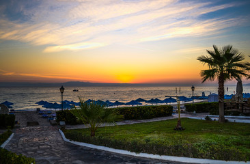 Sunrise on the beach resort. The sun had not yet appeared on the horizon